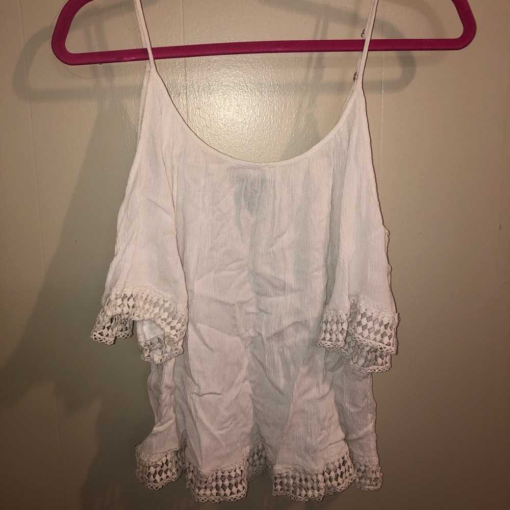 Shoulder cut out white flowy top